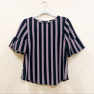 Black white and red, flared sleeved blouse. Size Small